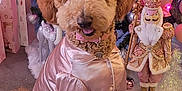 Lola joined the competition — help win amazing prizes! dog, pajamas, bow, christmas_tree, ornaments, gift_boxes, nutcracker, carpet, holiday, decorations, pink, silver, fur, pet, indoor, festive, sitting, cute, celebration, winter