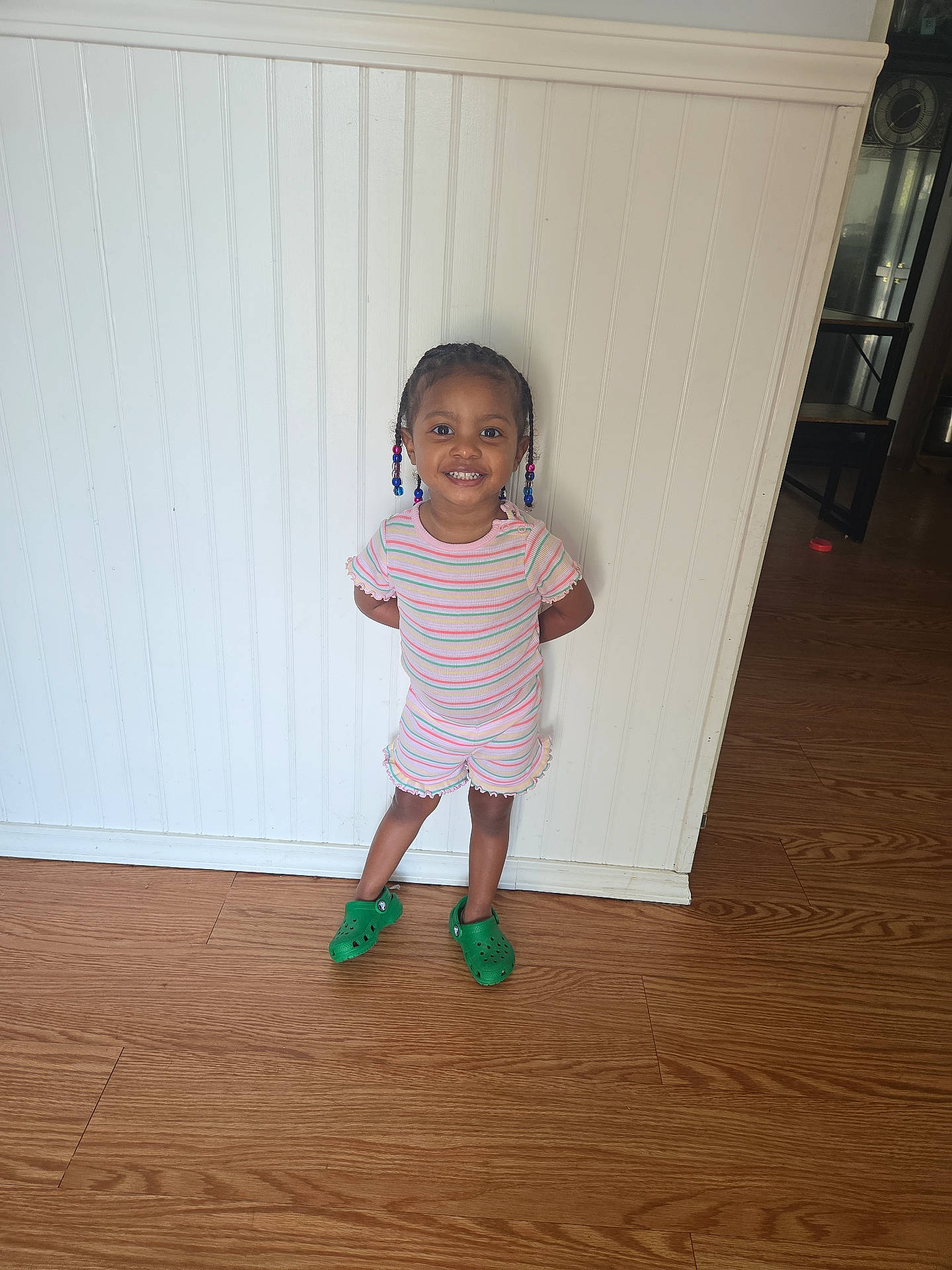 Amora is registered to the contest to win money with this photo: bodypart, child, clothing, dress, face, female, finger, footwear, girl, hand, hardwood, head, indoors, interiordesign, person, photography, plywood, portrait, shoe, wood