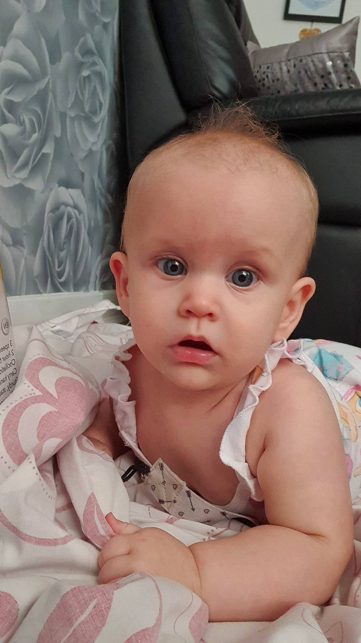 April joined the competition — help win amazing prizes! baby, baby_toddler_clothing, cheek, comfort, dress, eye, eyebrow, eyelash, flash_photography, hair, head, iris, lip, mouth, neck, nose, person, pink, skin, surprise