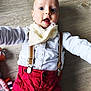 Octave a rejoint le concours — aidez-le/la à gagner de superbes lots ! baby, bib, blue_eyes, child, clothing, cute, expression, face, indoor, infant, light, open_mouth, person, portrait, reaching, red_pants, small_toy, suspenders, white_shirt, wooden_floor