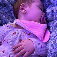 Lakelyn is registered to the contest to win money with this photo: baby, sleeping, pacifier, blanket, purple, pink, cozy, infant, cute, sleep, hand, clothing, bib, soft, portrait, rest, child, warm, comfort, indoor
