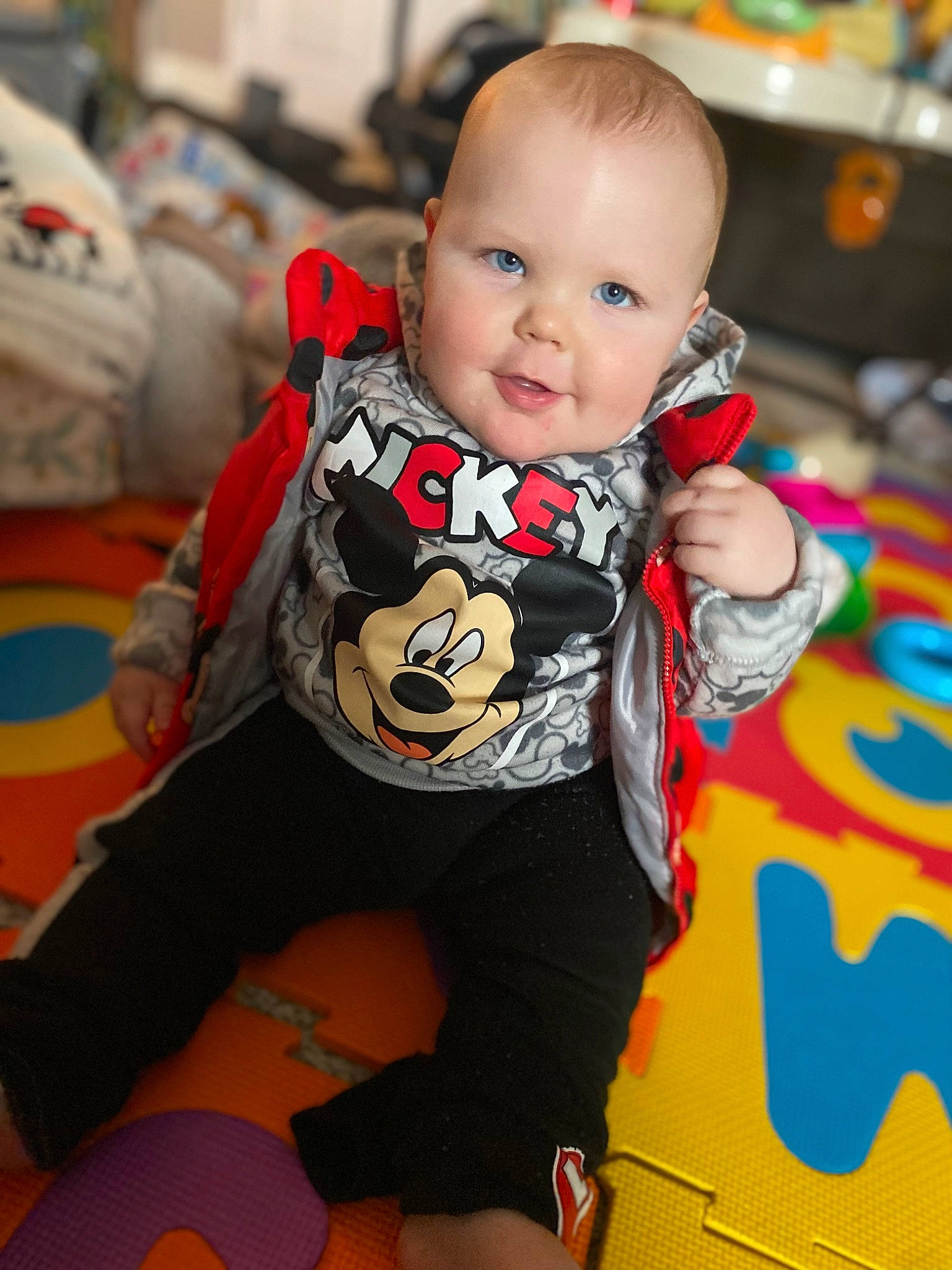 Cayson is registered to the contest to win money with this photo: baby, baby_toddler_clothing, cheek, child, comfort, event, floor, flooring, fun, happy, orange, person, photograph, play, room, sitting, skin, sleeve, smile, snapshot