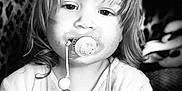 Cassie-Mai joined the competition — help win amazing prizes! toddler, child, pacifier, beads, black_and_white, portrait, long_hair, leopard_print, clothing, cute, face, indoor, baby, young_child, expression, person, sitting, closeup, soft_light, casual