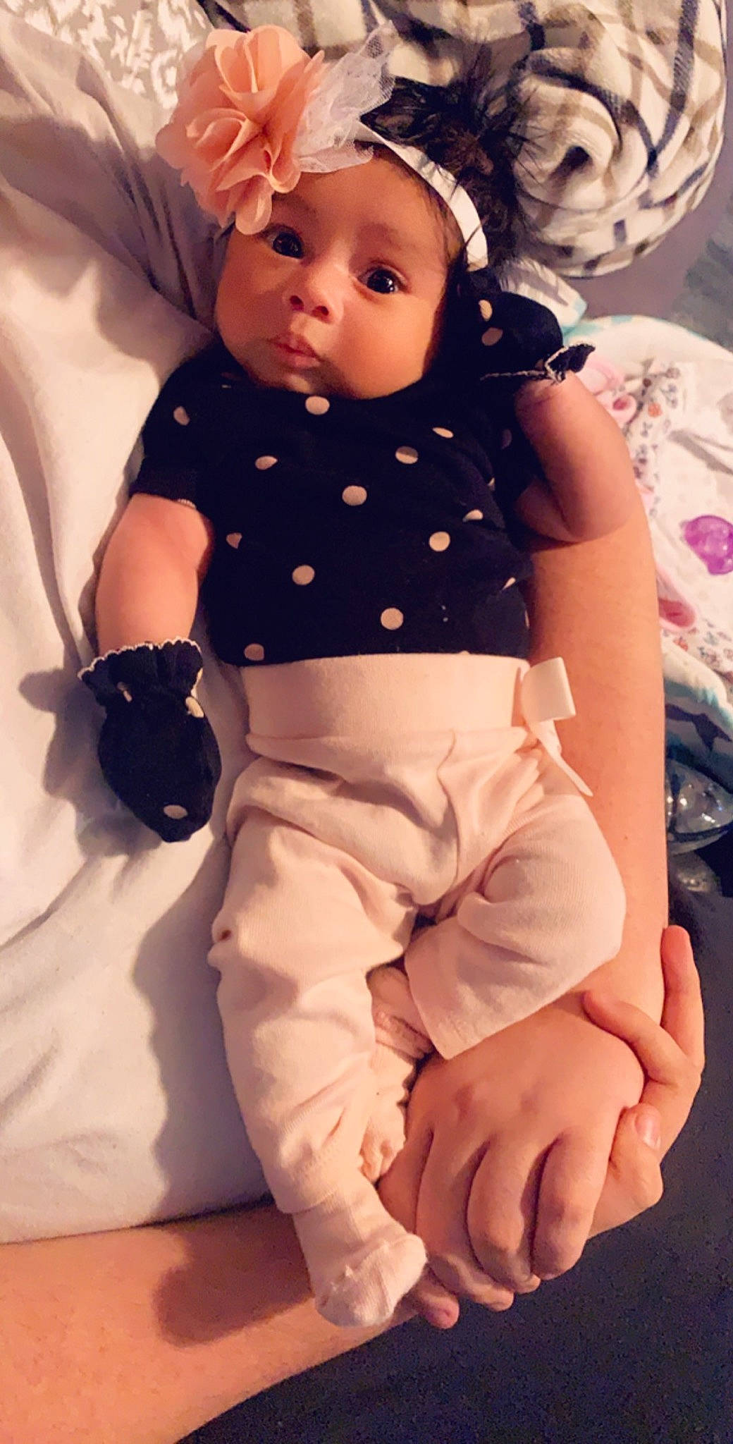 Hartlynn is registered to the contest to win money with this photo: arm, baby, baby_products, baby_toddler_clothing, cheek, child, finger, hand, person, sitting, skin, toddler