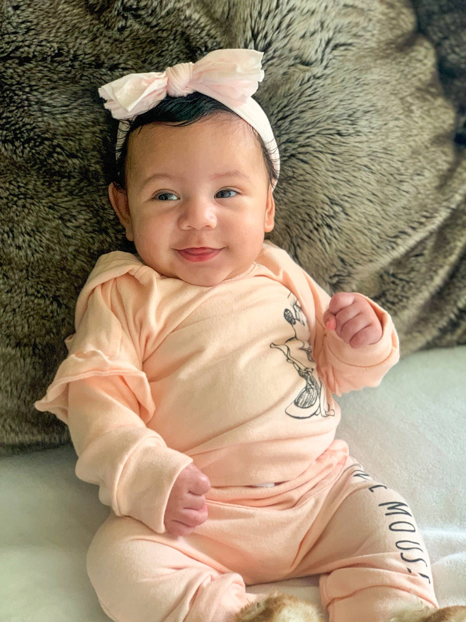 Kimora is registered to the contest to win money with this photo: baby, baby_toddler_clothing, cap, cheek, child, chin, comfort, eye, face, flash_photography, happy, head, human_body, iris, joy, lip, person, pink, skin, sleeve