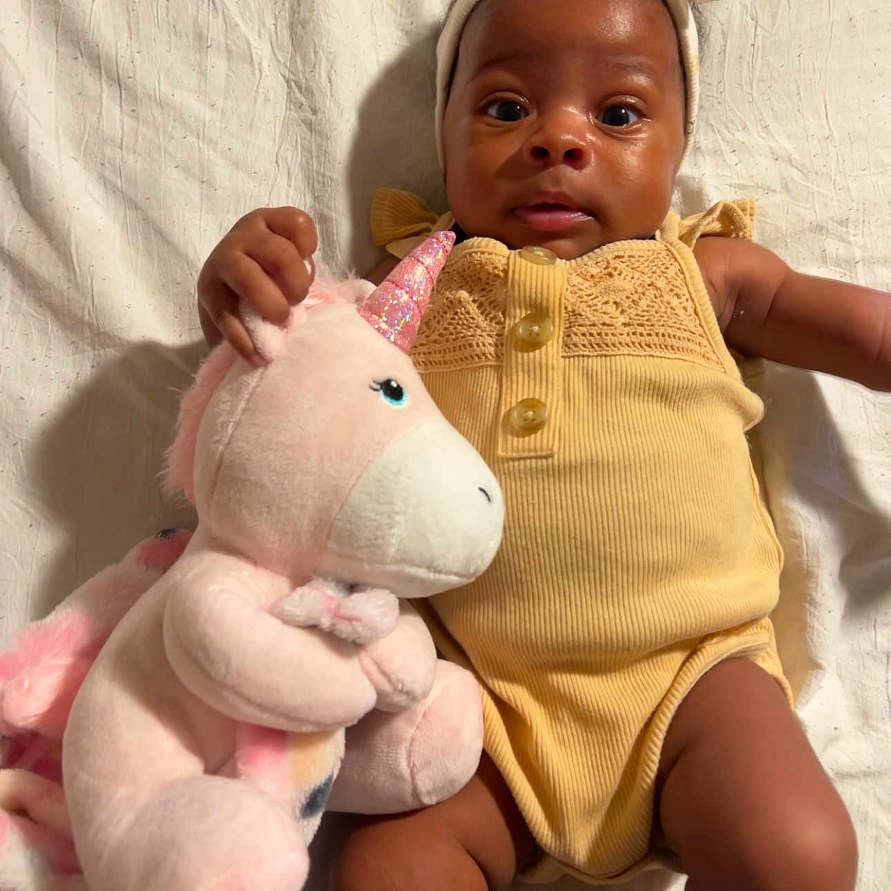 Nariyah joined the competition — help win amazing prizes! accessories, baby, bodypart, bonnet, clothing, couch, doll, face, finger, furniture, hand, hat, head, newborn, person, photography, portrait, sitting, teddybear, toy