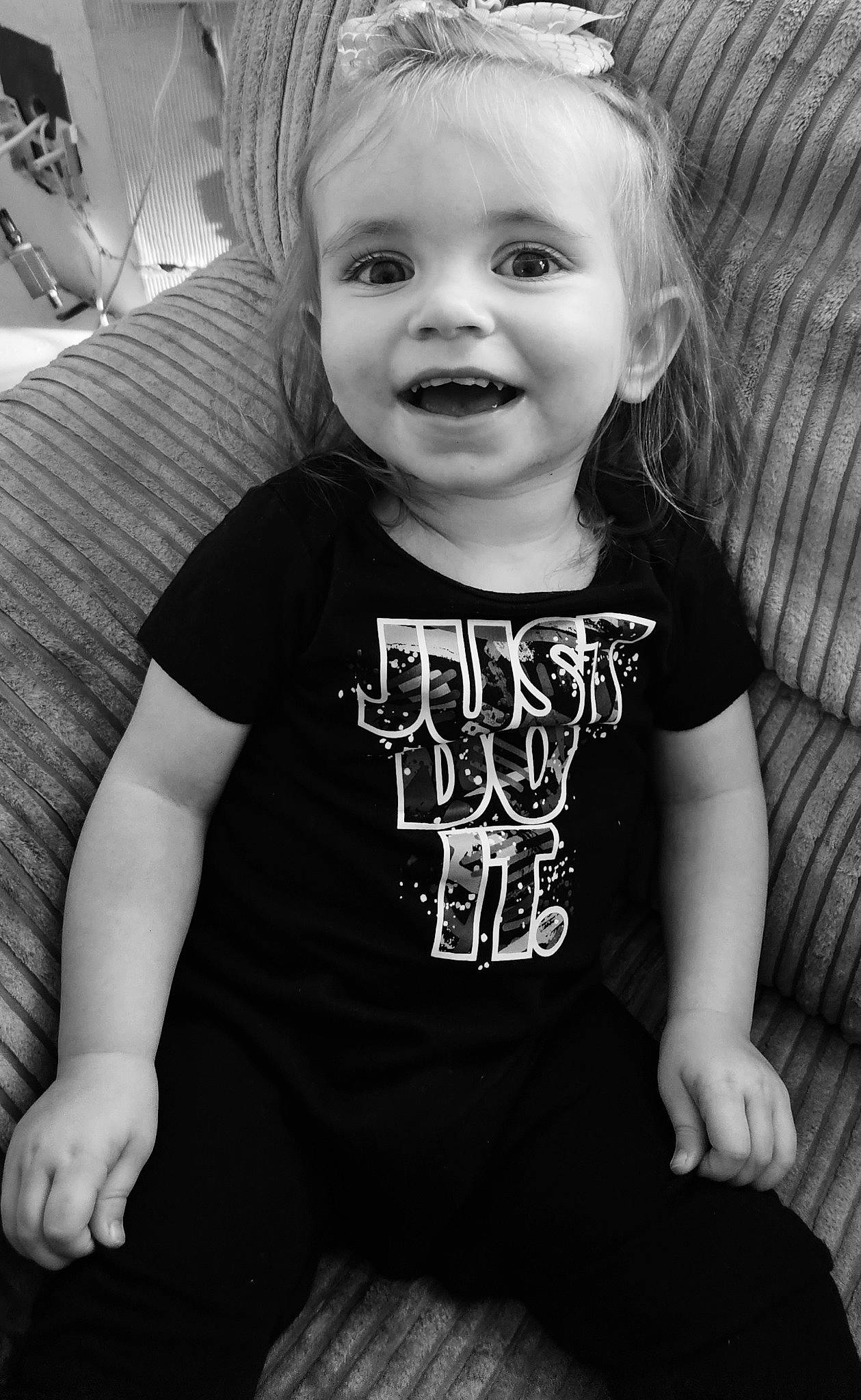 Edith'S joined the competition — help win amazing prizes! baby_toddler_clothing, black, black_and_white, cheek, cool, eye, flash_photography, hair, happy, head, iris, joy, person, photograph, skin, sleeve, smile, standing, style, t_shirt