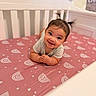 Angelica joined the competition — help win amazing prizes! baby, bedroom, child, clothing, cozy, crib, face, hands, happy, indoor, infant, mattress, nursery, photography, pigtails, pink, portrait, rainbow, sitting, smiling