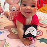 Angelica joined the competition — help win amazing prizes! baby, bunny, child, crawling, cute, face, happy, indoor, infant, pink, play_mat, playroom, portrait, rattle, red_shirt, sitting, smiling, stuffed_animal, tongue_out, toys
