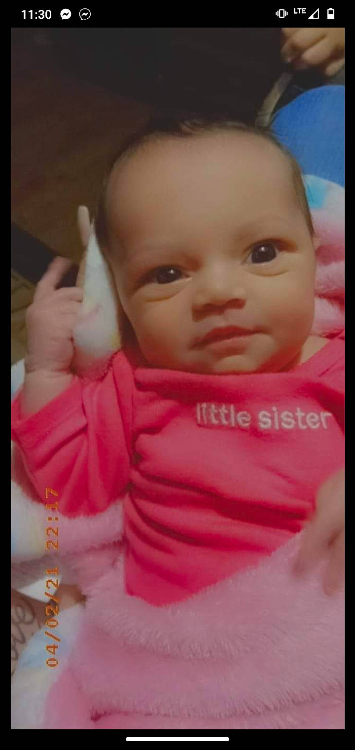 Jolene is registered to the contest to win money with this photo: baby, baby_products, baby_toddler_clothing, beauty, cheek, child, eyelash, fun, gesture, happy, iris, lip, magenta, nose, person, pink, room, skin, sleeve, thumb