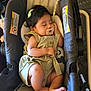 Ruth joined the competition — help win amazing prizes! baby, sleeping, pacifier, baby_carrier, infant, cute, bow, clothing, resting, peaceful, indoor, soft, cushion, warning_label, foot, hand, portrait, child, toddler, relaxing