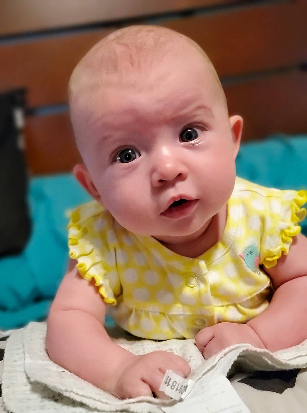 Esmae is registered to the contest to win money with this photo: baby, baby_products, baby_toddler_clothing, cheek, child, linens, peach, person, pink, skin, toddler