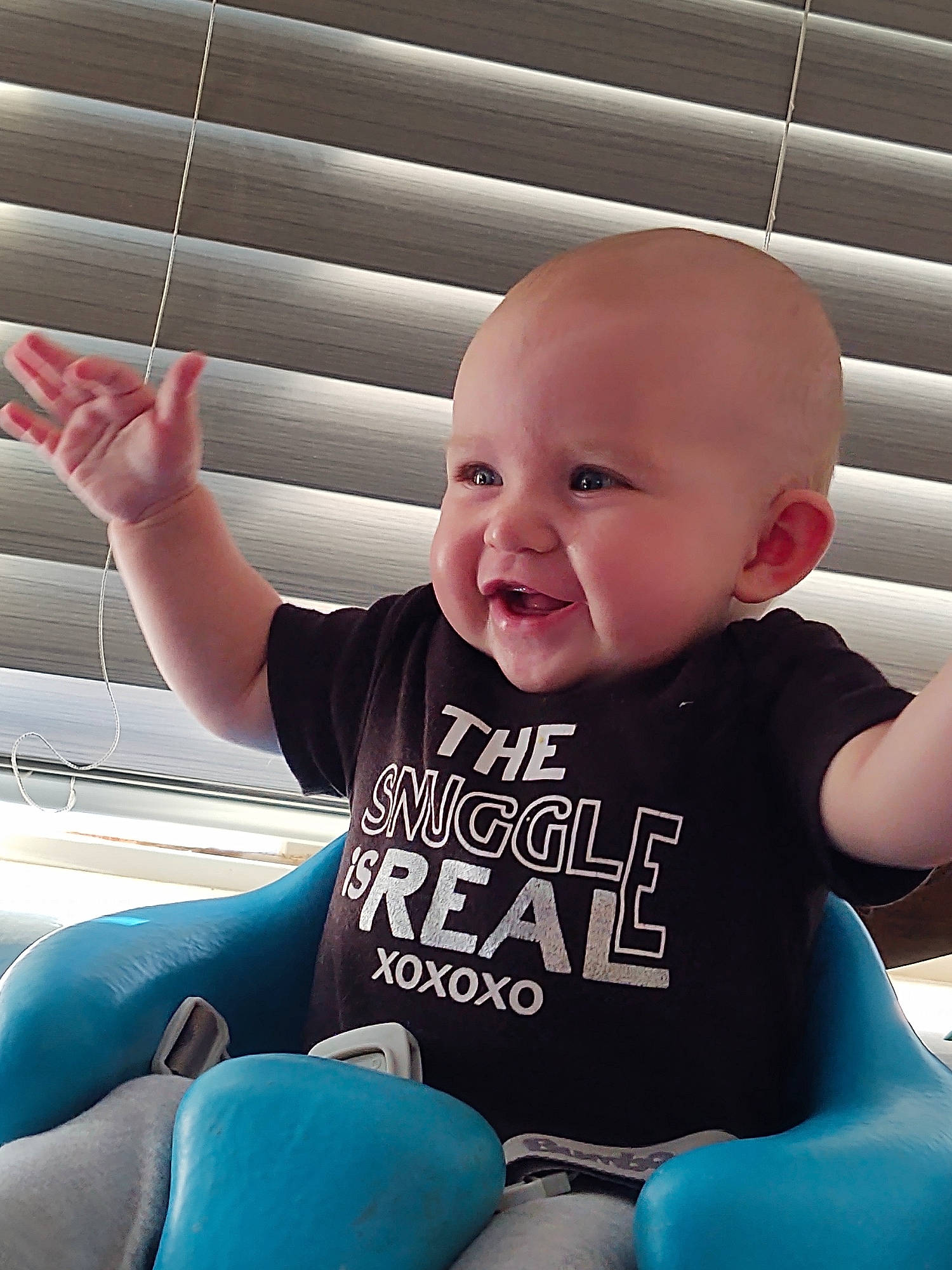 Esmae joined the competition — help win amazing prizes! baby, baby_laughing, baby_toddler_clothing, child, comfort, ear, finger, lap, laugh, mouth, organ, person, sitting, skin, thumb, toddler, tongue, window_covering, window_treatment