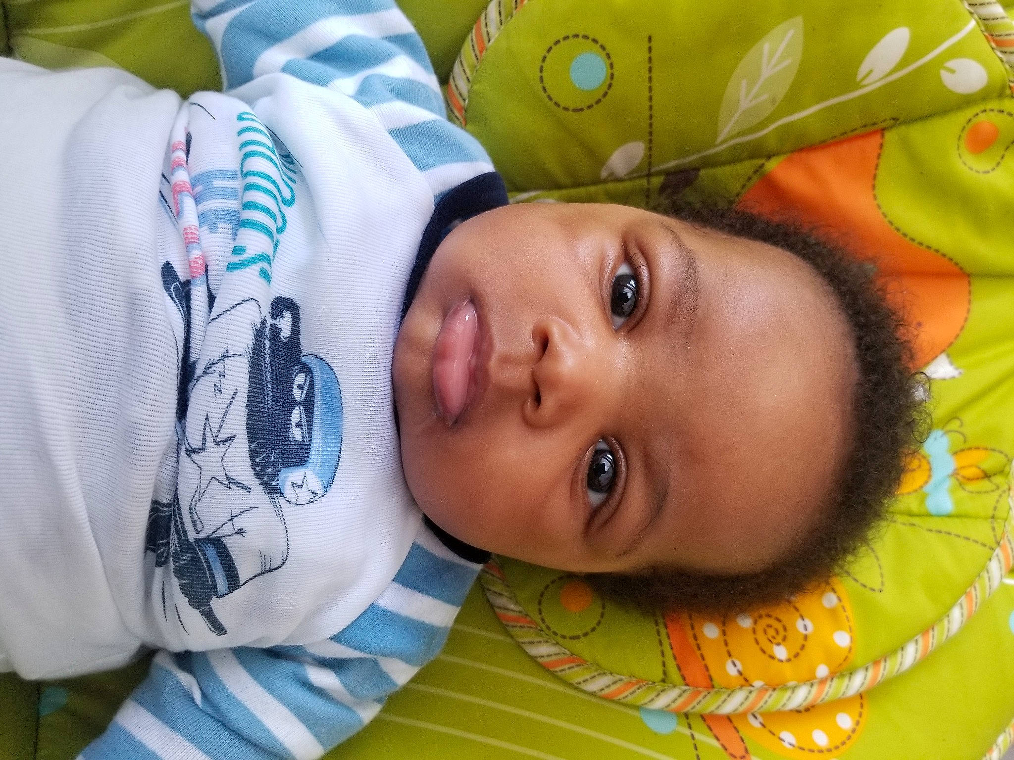 Chris is registered to the contest to win money with this photo: baby, baby_products, cheek, child, eye, eyebrow, eyelash, fun, hair, happy, head, iris, leisure, linens, nose, person, plant, skin, textile, toddler