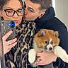 Boston a rejoint le concours — aidez-le/la à gagner de superbes lots ! affection, black_clothing, blanket, couple, cute, dog, elevator, glasses, indoor, kiss, leopard_print, mirror, pet, phone, puppy, ring, scarf, selfie, warm, young_adult