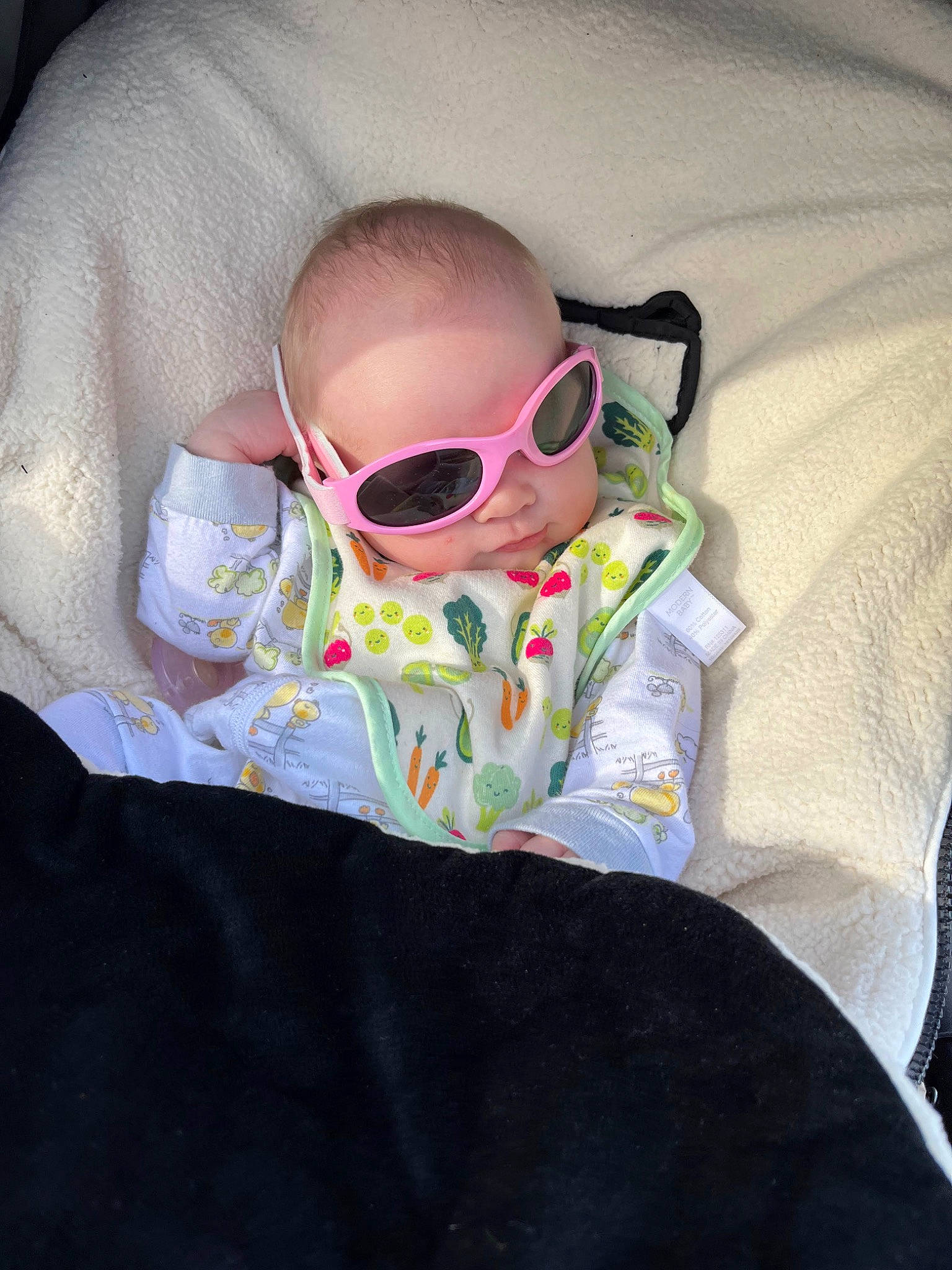 Charlie is registered to the contest to win money with this photo: baby, baby_products, baby_toddler_clothing, cheek, child, chin, comfort, eye, eye_glass_accessory, eyewear, face, glasses, goggles, hair, head, person, personal_protective_equipment, sleeve, sunglasses, toddler