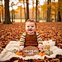 baby, infant, autumn, fall_leaves, pumpkins, forest, blanket, smiling, child, outdoor, seasonal, cute, portrait, nature, orange, brown, green, overalls, happy, young