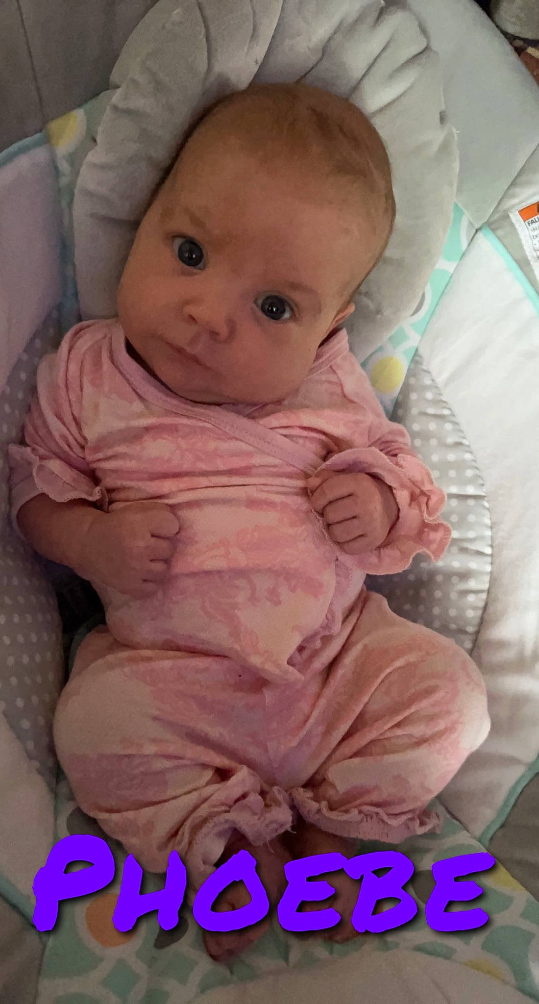 Phoebe joined the competition — help win amazing prizes! baby, baby_safety, baby_toddler_clothing, cheek, child, comfort, eyelash, face, human_body, iris, lip, nose, person, pink, skin, sleeve, smile, stomach, textile, thumb