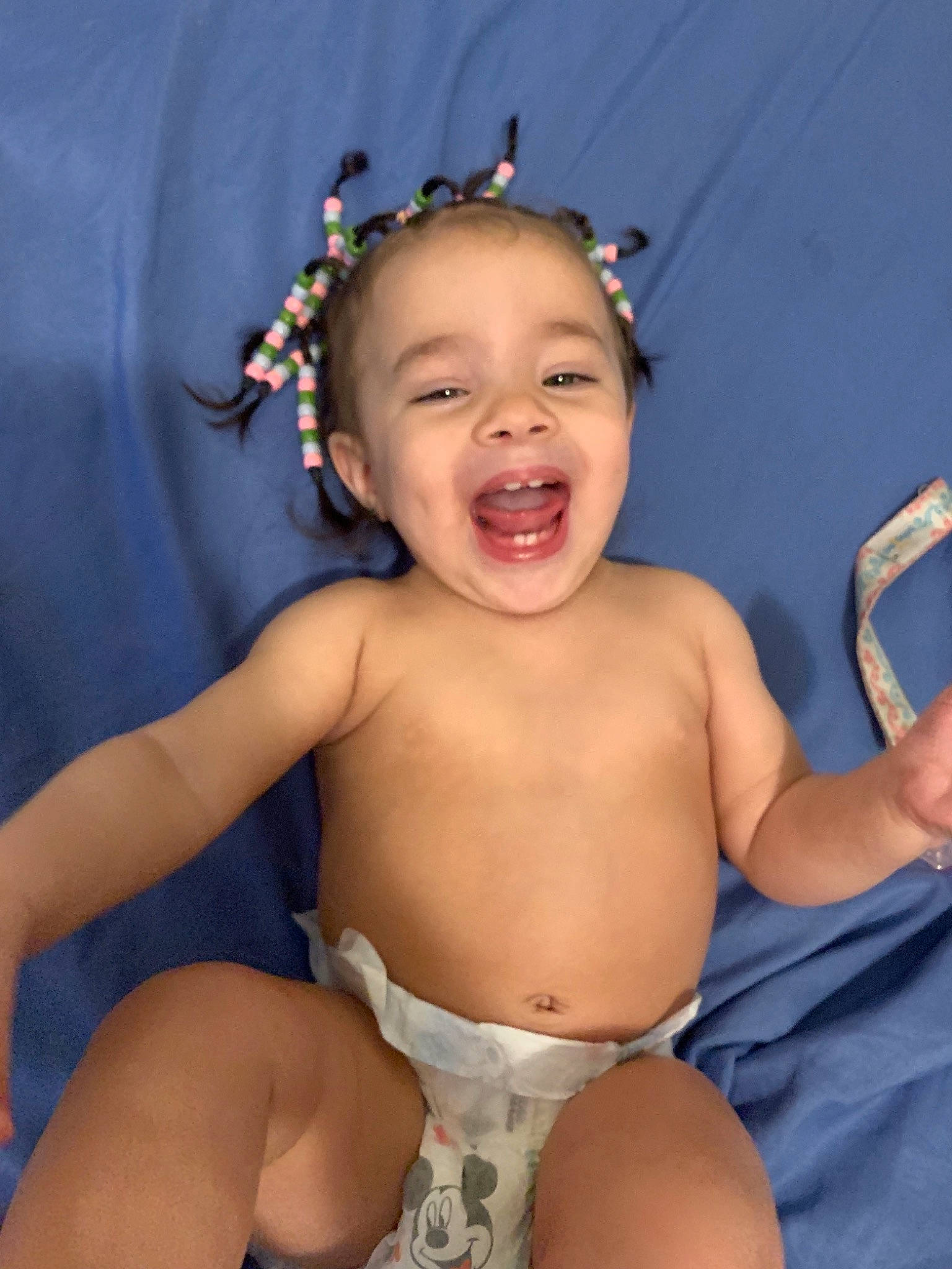 Aaliyah is registered to the contest to win money with this photo: arm, baby, child, diaper, fun, leg, person, smile, toddler
