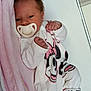 Maria participe au concours pour gagner de l'argent avec cette photo : newborn, baby, pacifier, pink_blanket, minnie_mouse, onesie, infant, cute, sleepwear, face, hands, socks, soft_toy, bed, resting, small, child, portrait, indoors, clothing