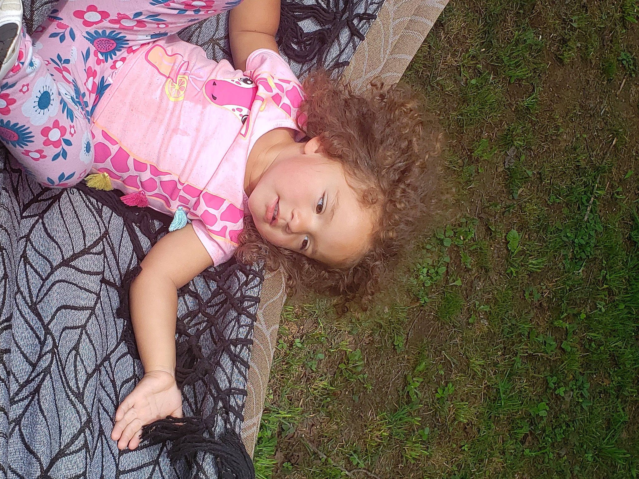 Aubrielle joined the competition — help win amazing prizes! baby, baby_toddler_clothing, child, fun, grass, happy, human_body, human_leg, leisure, magenta, pattern, people_in_nature, person, plant, sitting, skin, soil, thigh, toddler, tree