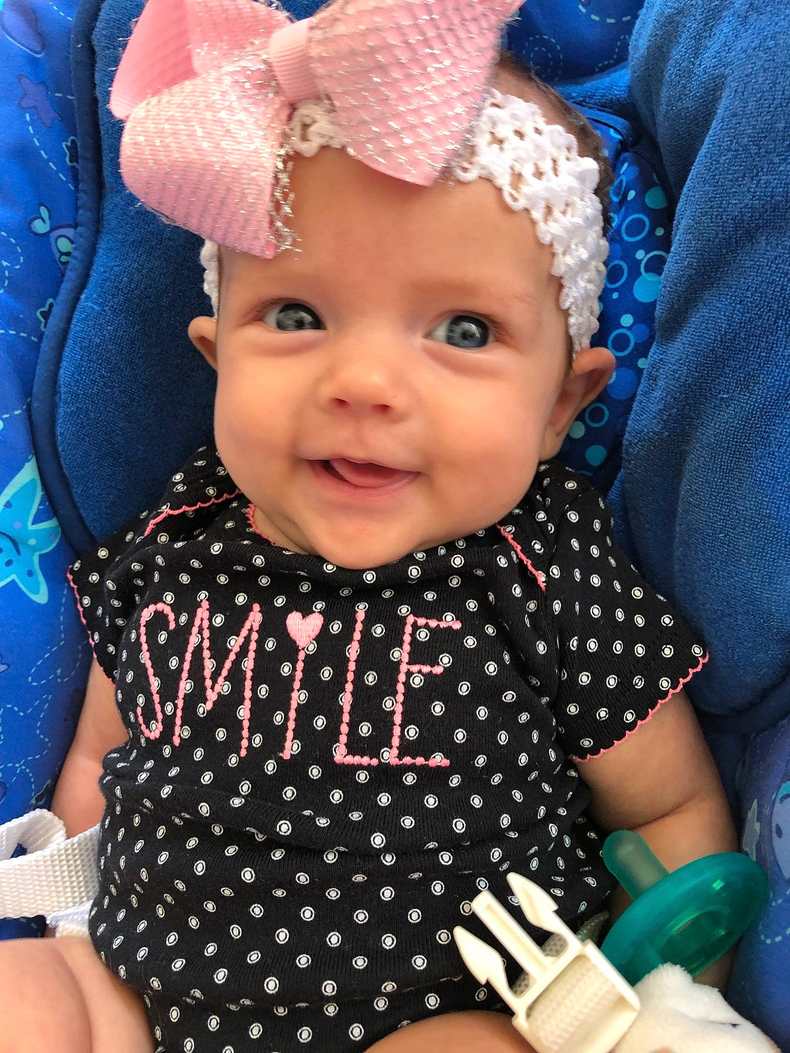 Lynley is registered to the contest to win money with this photo: baby, baby_products, baby_toddler_clothing, bonnet, cheek, child, crochet, design, ear, face, fashion_accessory, head, headgear, headwear, lip, pattern, person, play, polka_dot, product