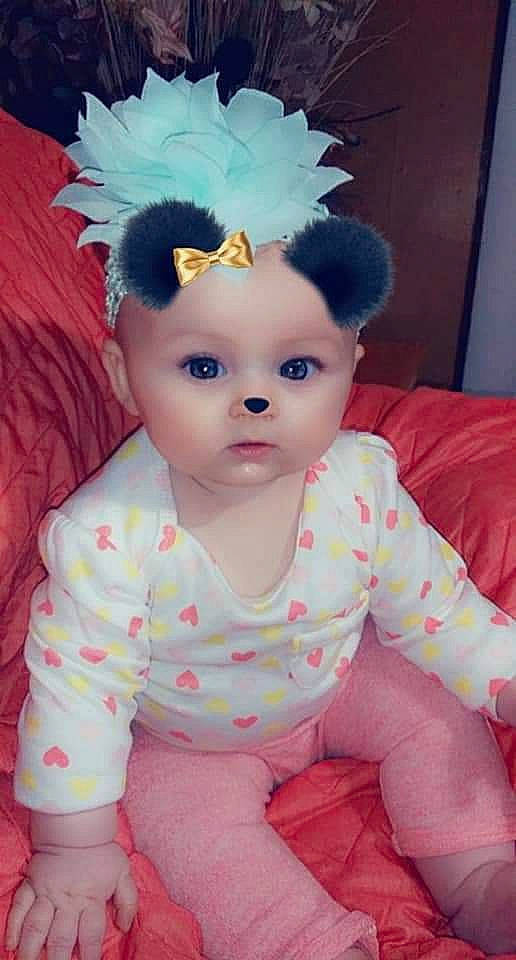 Chevylynn is registered to the contest to win money with this photo: baby, cheek, child, hair_accessory, head, person, pink, skin, toddler, toy