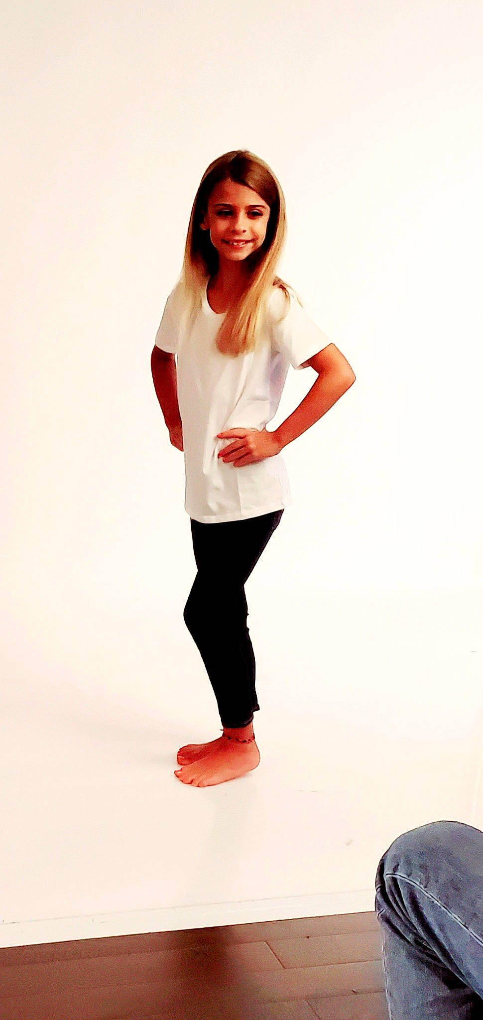 Gabrielle joined the competition — help win amazing prizes! beauty, denim, elbow, electric_blue, fashion_design, fashion_model, formal_wear, gesture, happy, human_leg, joy, knee, leg, person, sitting, sleeve, smile, sportswear, street_fashion, t_shirt