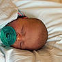 Barrett is registered to the contest to win money with this photo: baby, pacifier, sleeping, blanket, infant, face, head, skin, peaceful, closeup, indoors, soft, rest, newborn, child, comfort, bed, nap, cute, toddler