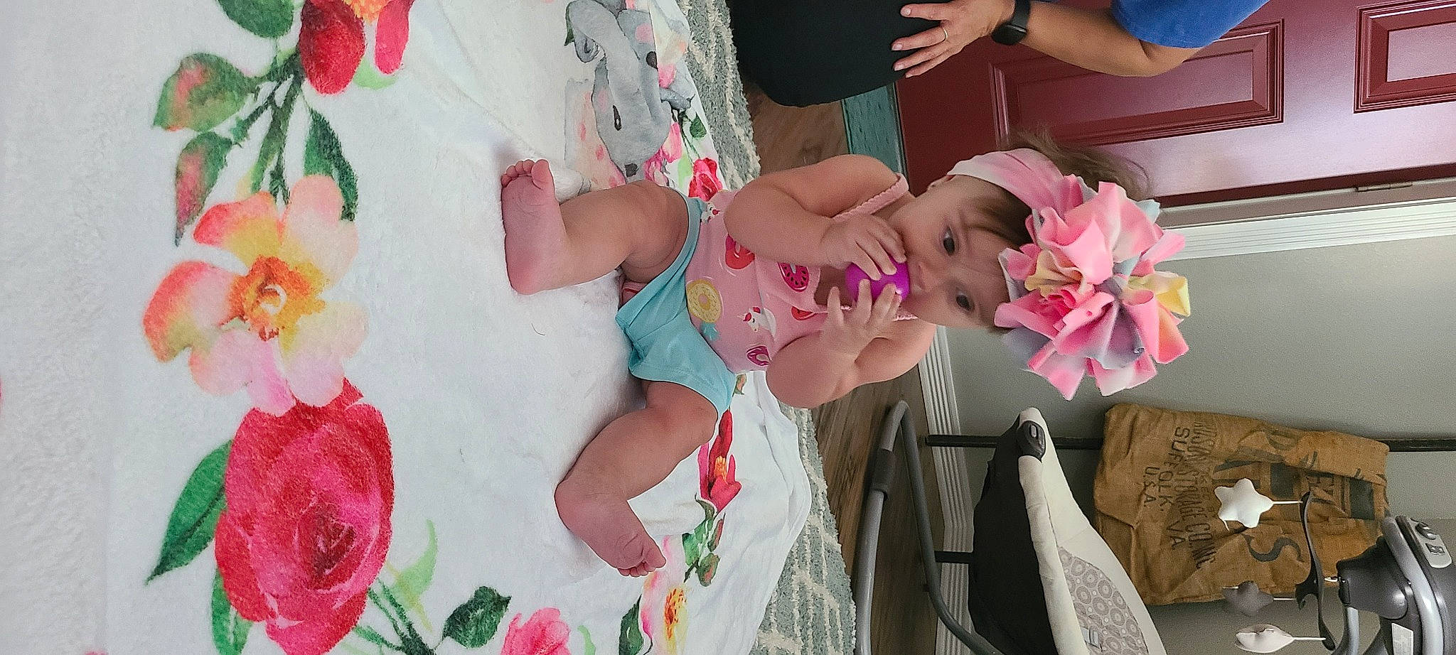Rylee joined the competition — help win amazing prizes! baby, baby_toddler_clothing, dress, fashion, finger, flower, hand, happy, hat, headgear, headwear, leg, magenta, person, petal, pink, plant, product, skin, textile