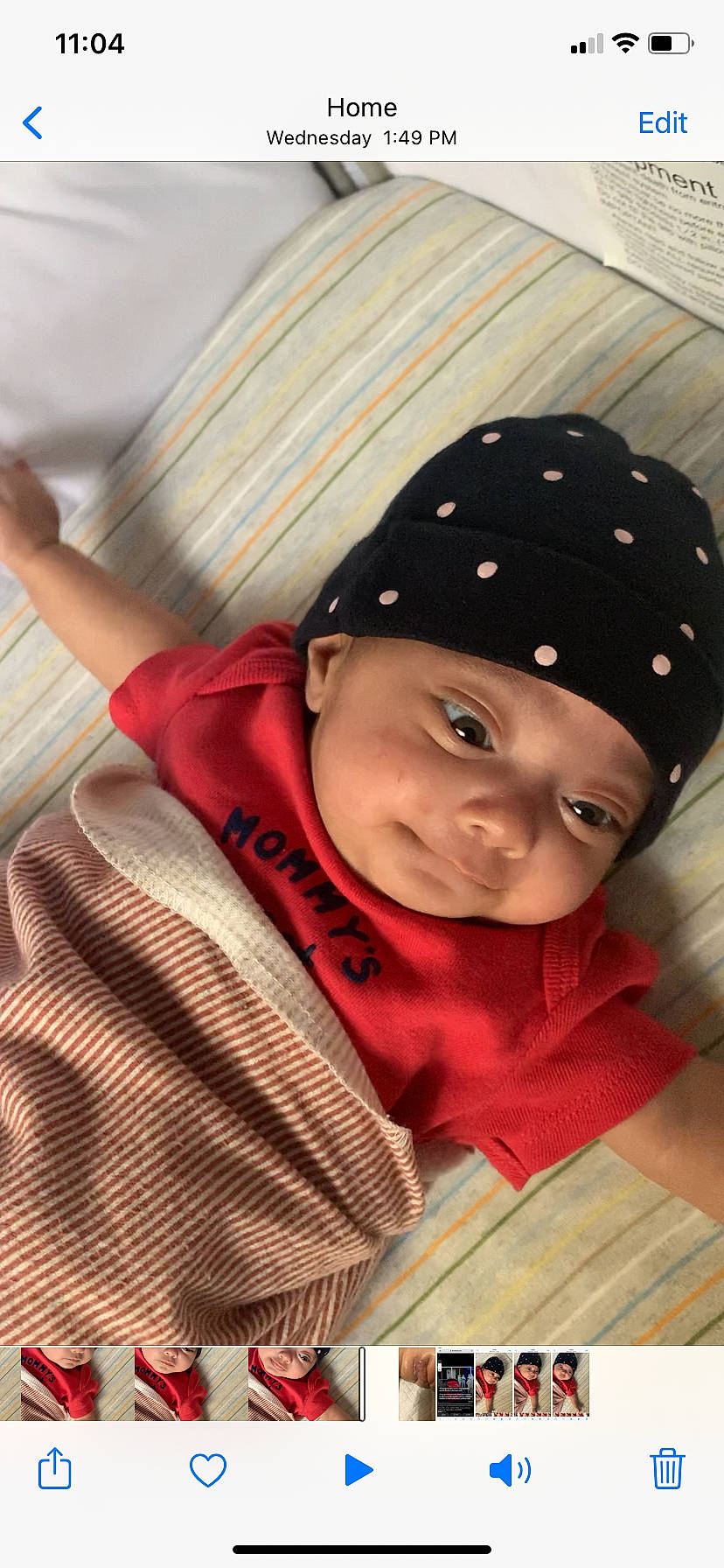 Irha is registered to the contest to win money with this photo: baby, baby_toddler_clothing, beanie, cap, child, comfort, facial_expression, fashion_accessory, flooring, fun, happy, headgear, headwear, knit_cap, outerwear, pattern, person, skin, sleeve, toddler