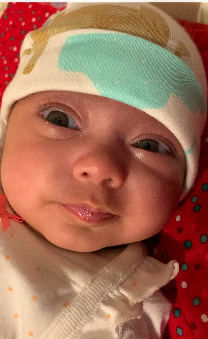 Irha joined the competition — help win amazing prizes! baby, cap, cheek, chin, eye, eyebrow, eyelash, face, facial_expression, forehead, happy, headwear, human, iris, lip, mouth, nose, person, pink, skin
