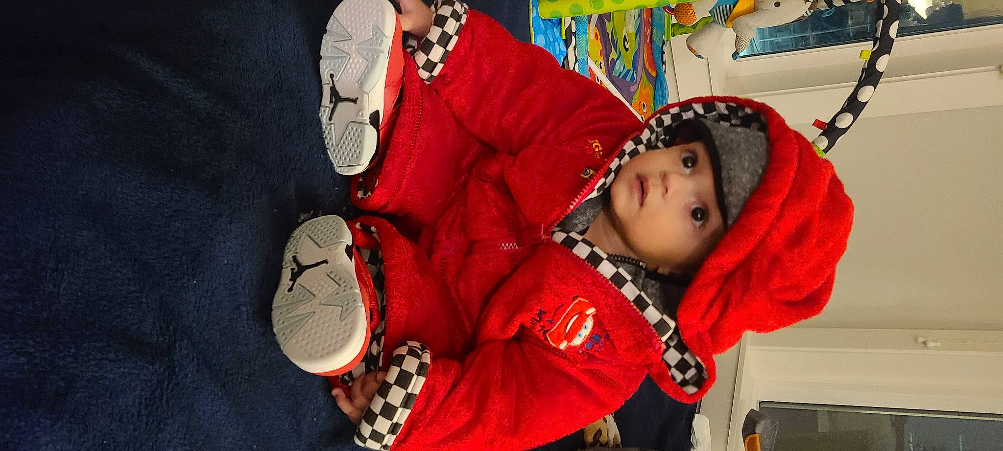 Keith joined the competition — help win amazing prizes! beanie, cap, carmine, child, costume, event, fashion_accessory, fun, glove, happy, headwear, knit_cap, leisure, magenta, outdoor_shoe, pattern, person, room, toddler, tradition