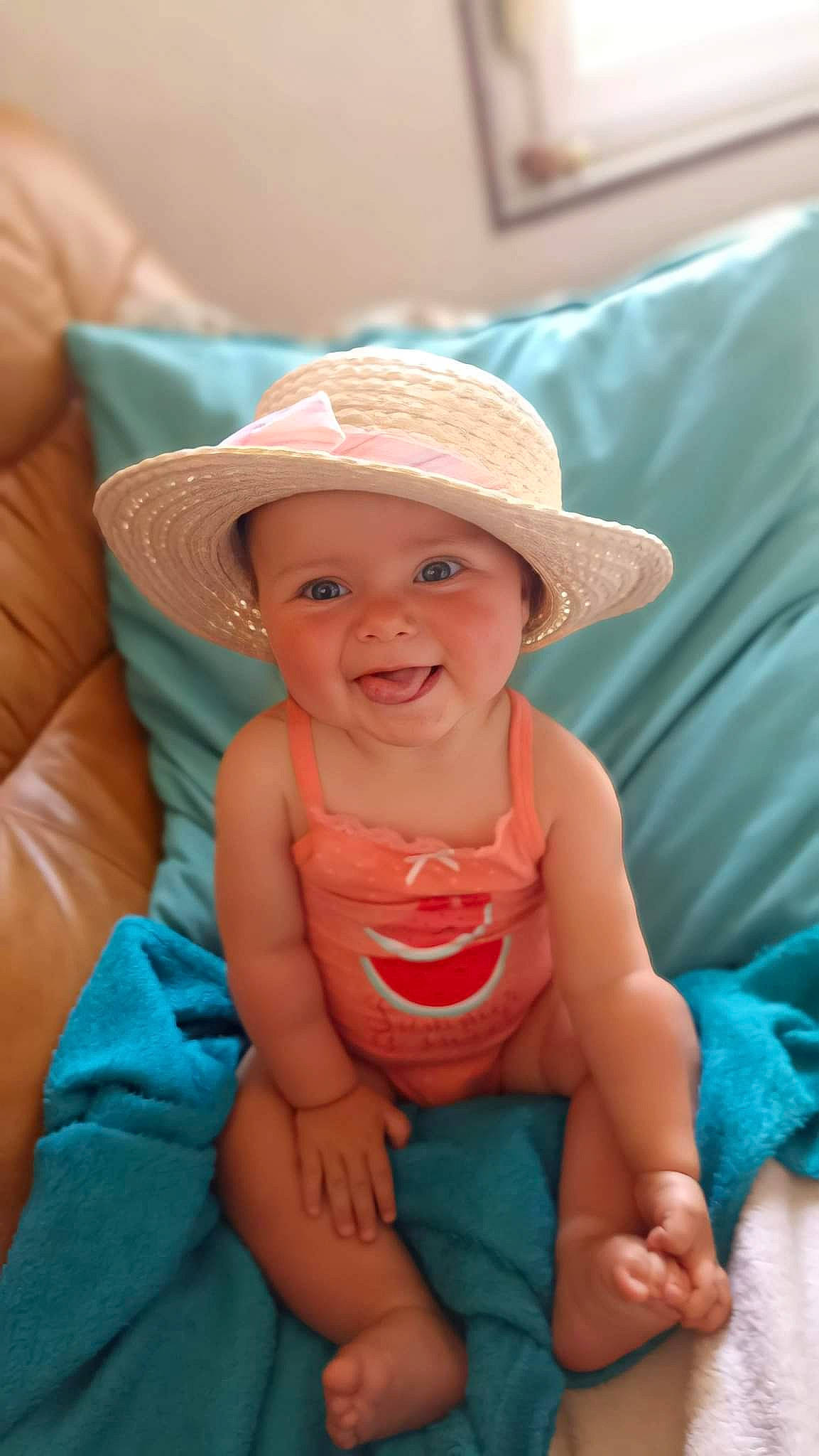 Shelby participe au concours pour gagner de l'argent avec cette photo : baby, blue, cap, cheek, chin, comfort, eye, face, finger, happy, hat, head, headwear, joy, leisure, lip, mouth, person, skin, smile