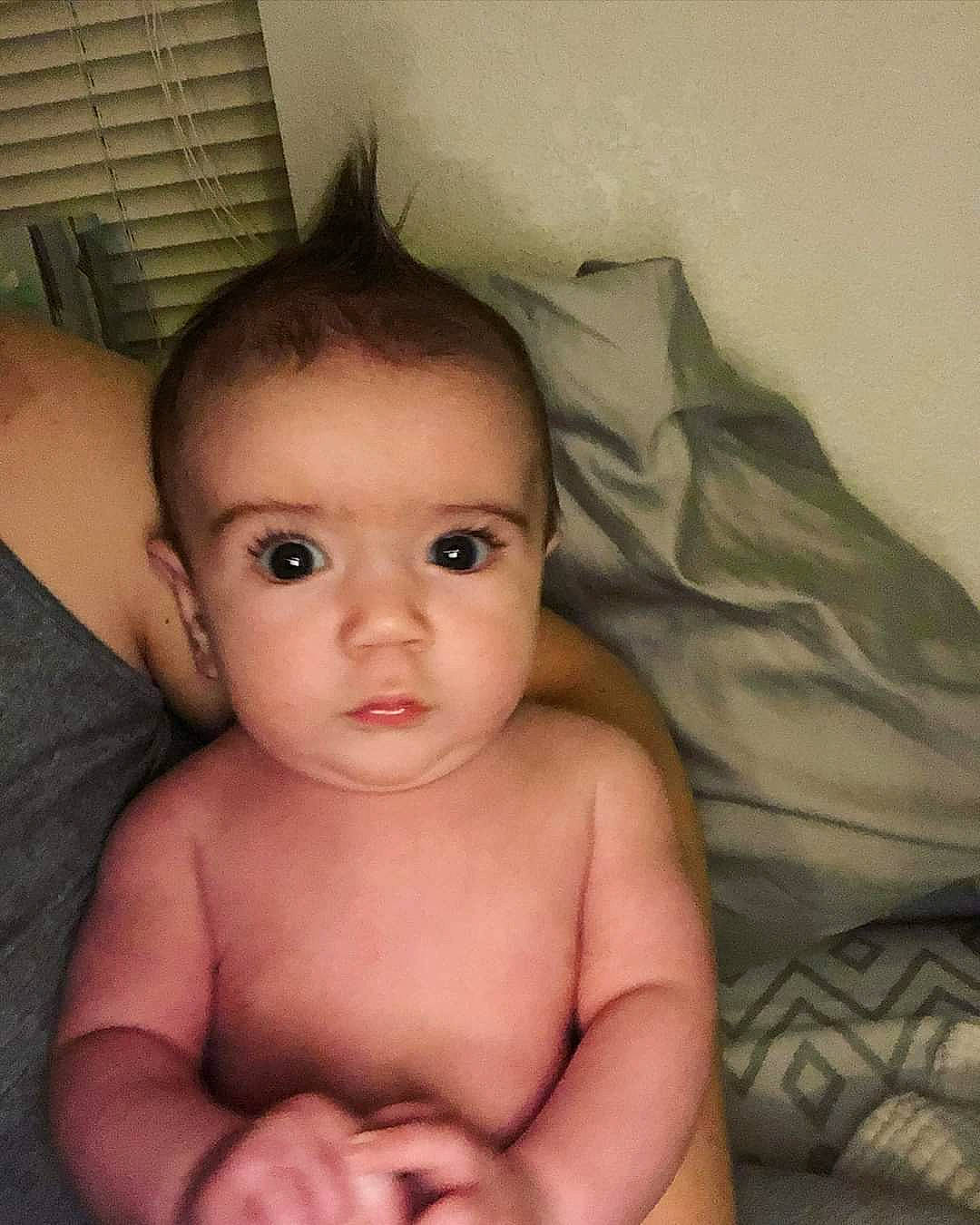 Bodhi is registered to the contest to win money with this photo: arm, baby, cheek, chest, child, chin, eye, eyebrow, face, forehead, head, iris, lip, mouth, muscle, nose, organ, person, skin, stomach