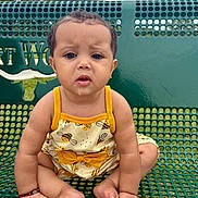 Zoe Zawadi joined the competition — help win amazing prizes! baby, child, bench, green, outdoor, cloudy_sky, yellow_clothing, cute, drool, expression, sitting, person, skin, hair, earrings, bracelet, feet, hands, summer, daytime