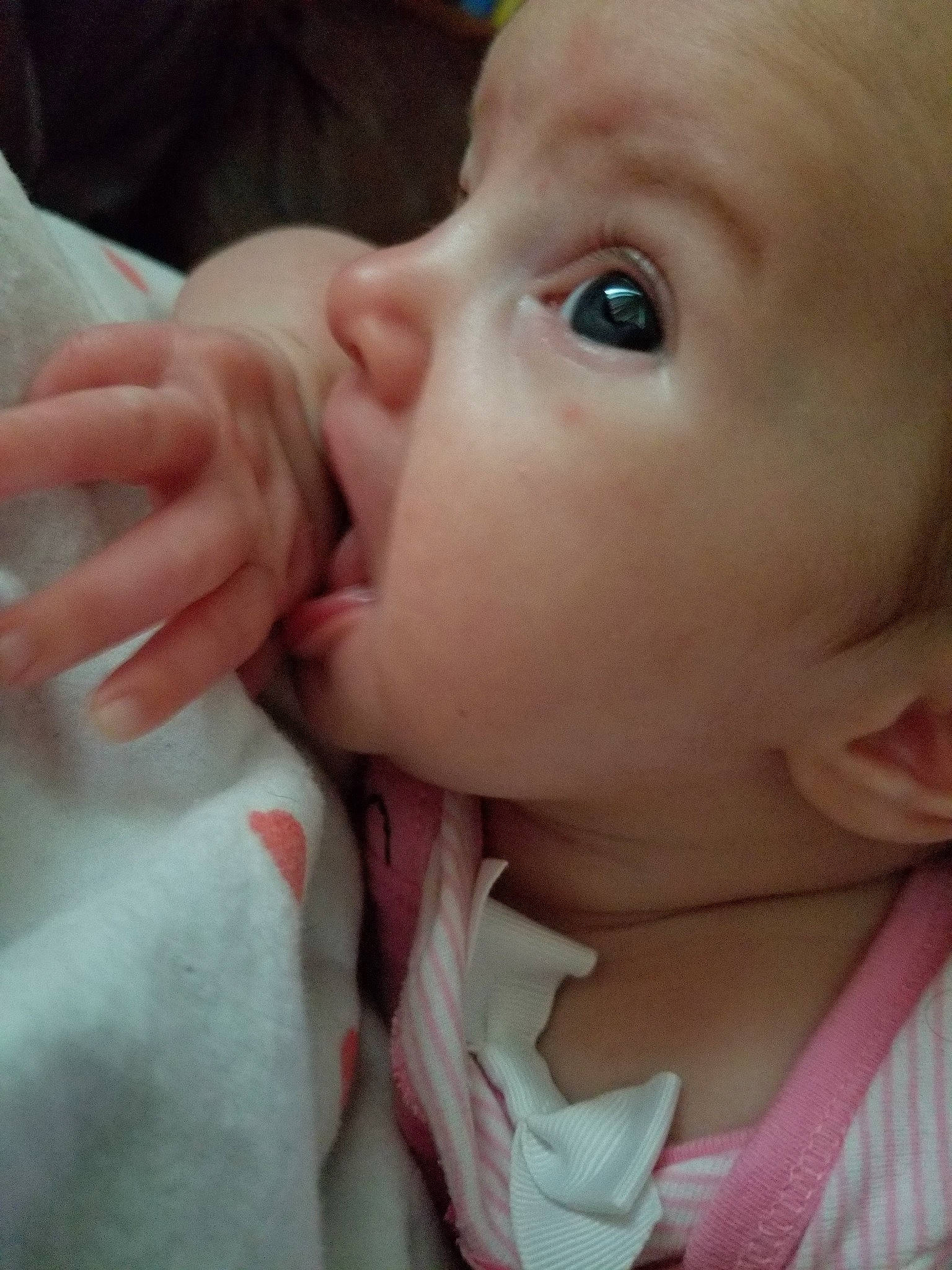 Jubilee is registered to the contest to win money with this photo: baby, cheek, child, chin, close_up, ear, eye, eyebrow, face, finger, forehead, hand, head, lip, mouth, nose, person, skin, toddler