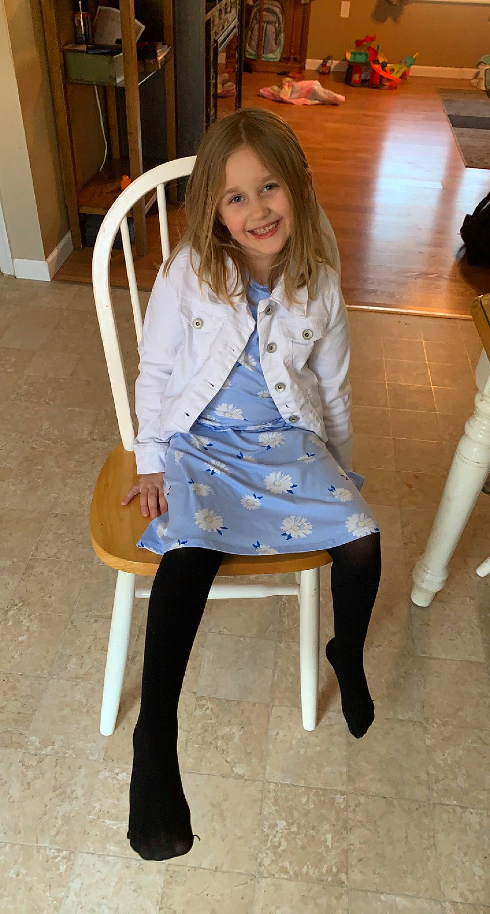 Alexia is registered to the contest to win money with this photo: blazer, chair, denim, fashion_design, flooring, hair, hairstyle, joint, joy, knee, long_hair, person, photograph, shoulder, sleeve, smile, standing, street_fashion, textile, thigh