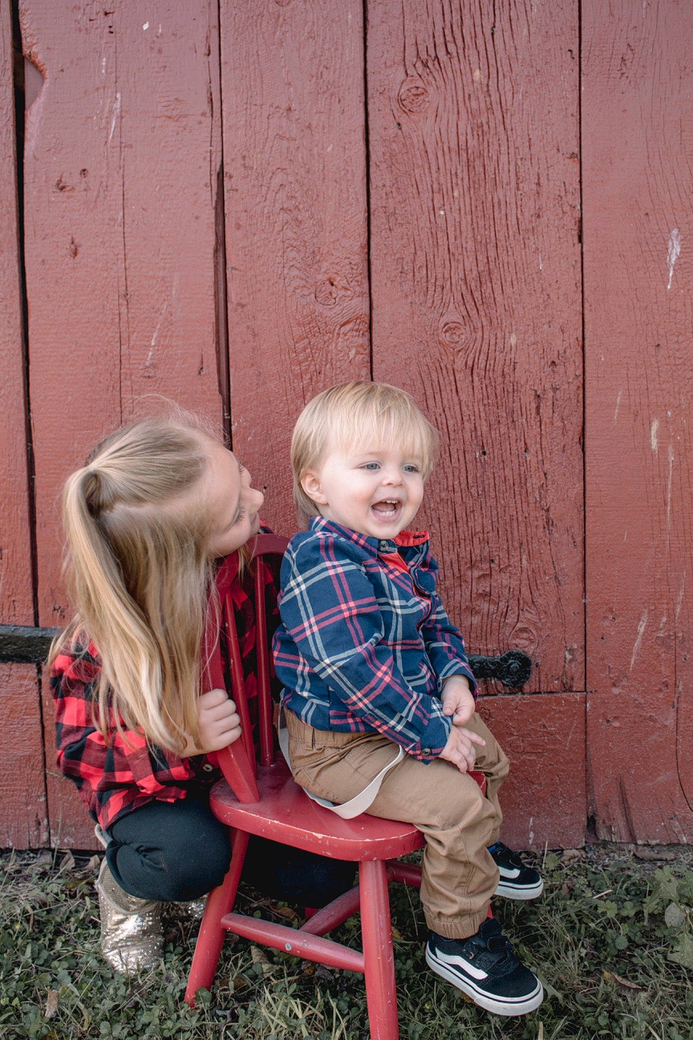 Kaiden is registered to the contest to win money with this photo: blond, chair, child, footwear, fun, grass, hairstyle, human_body, leaf, leg, leisure, people_in_nature, person, pink, plant, shoe, smile, sneakers, toddler, tree