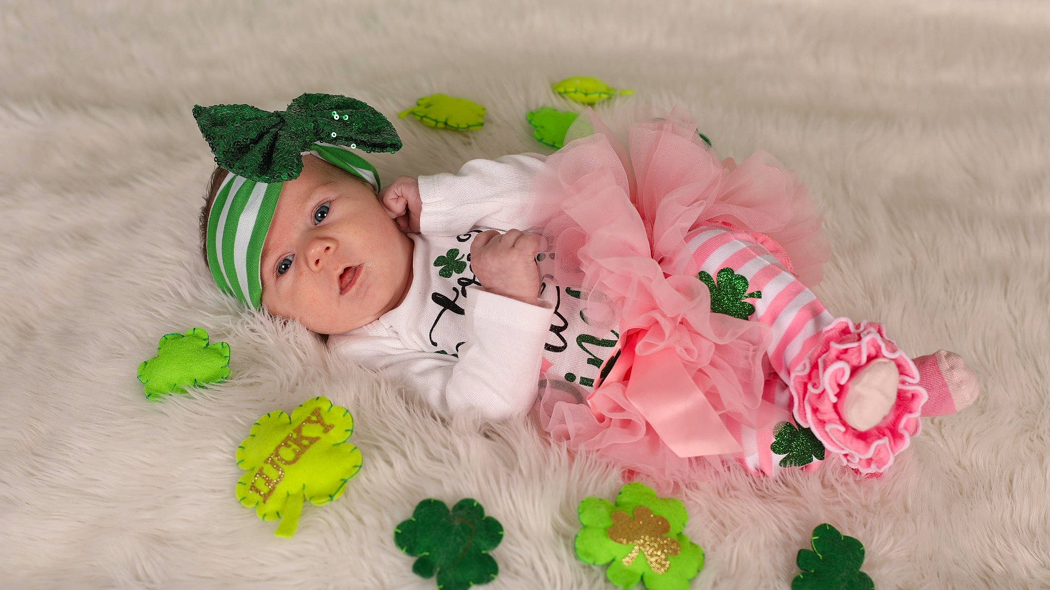Alivia is registered to the contest to win money with this photo: art, baby, baby_products, baby_toddler_clothing, baby_toys, child, costume_hat, fashion_accessory, font, grass, hair_accessory, happy, headwear, linens, magenta, pattern, peach, person, petal, pink