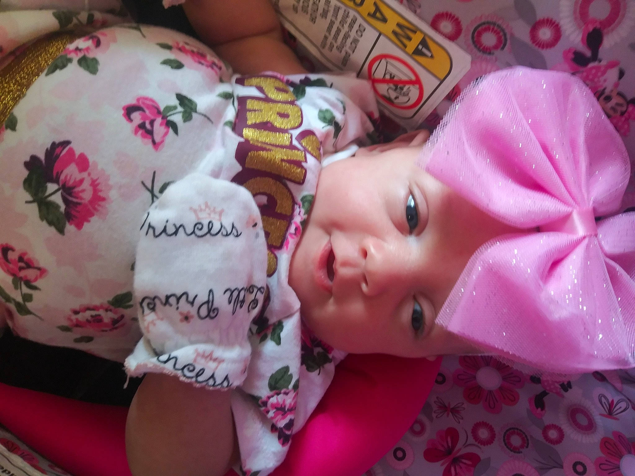 Kynzlee joined the competition — help win amazing prizes! baby, baby_toddler_clothing, cheek, child, eyelash, happy, headwear, linens, lip, magenta, pattern, peach, person, pink, room, skin, sweetness, textile, toddler, toy