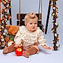 Olivia is registered to the contest to win money with this photo: apple, baby, child, cream_clothing, cute, decorative_flowers, flowers, headband, infant, innocent, playful, portrait, sitting, socks, soft_lighting, studio_photo, swing, teddy_bear, toy, wooden_swing