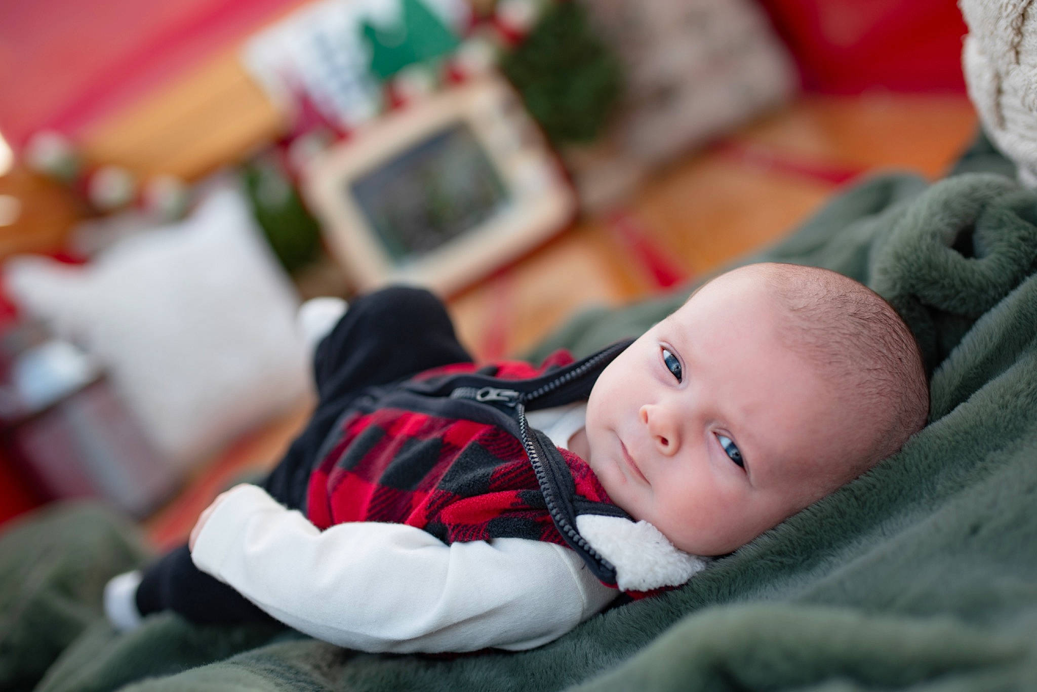 Winston is registered to the contest to win money with this photo: baby, baby_carriage, baby_products, baby_toddler_clothing, carmine, child, comfort, couch, fun, grass, happy, nap, person, plaid, portrait_photography, room, sitting, skin, toddler, tree