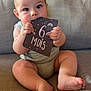 Malone a rejoint le concours — aidez-le/la à gagner de superbes lots ! baby, cheeks, clothing, comfort, couch, cute, eyes, face, feet, hand, holding, home, indoors, infant, legs, milestone, milestone_card, person, sitting, skin