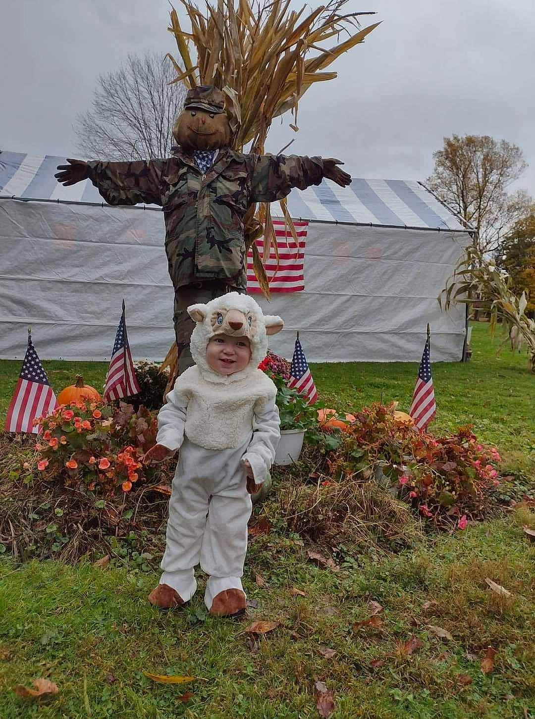 Isaiah joined the competition — help win amazing prizes! arecales, art, cloud, event, flower, fun, garden, grass, hat, headwear, joy, landscape, lawn, lawn_ornament, person, plant, pole, sculpture, sky, statue