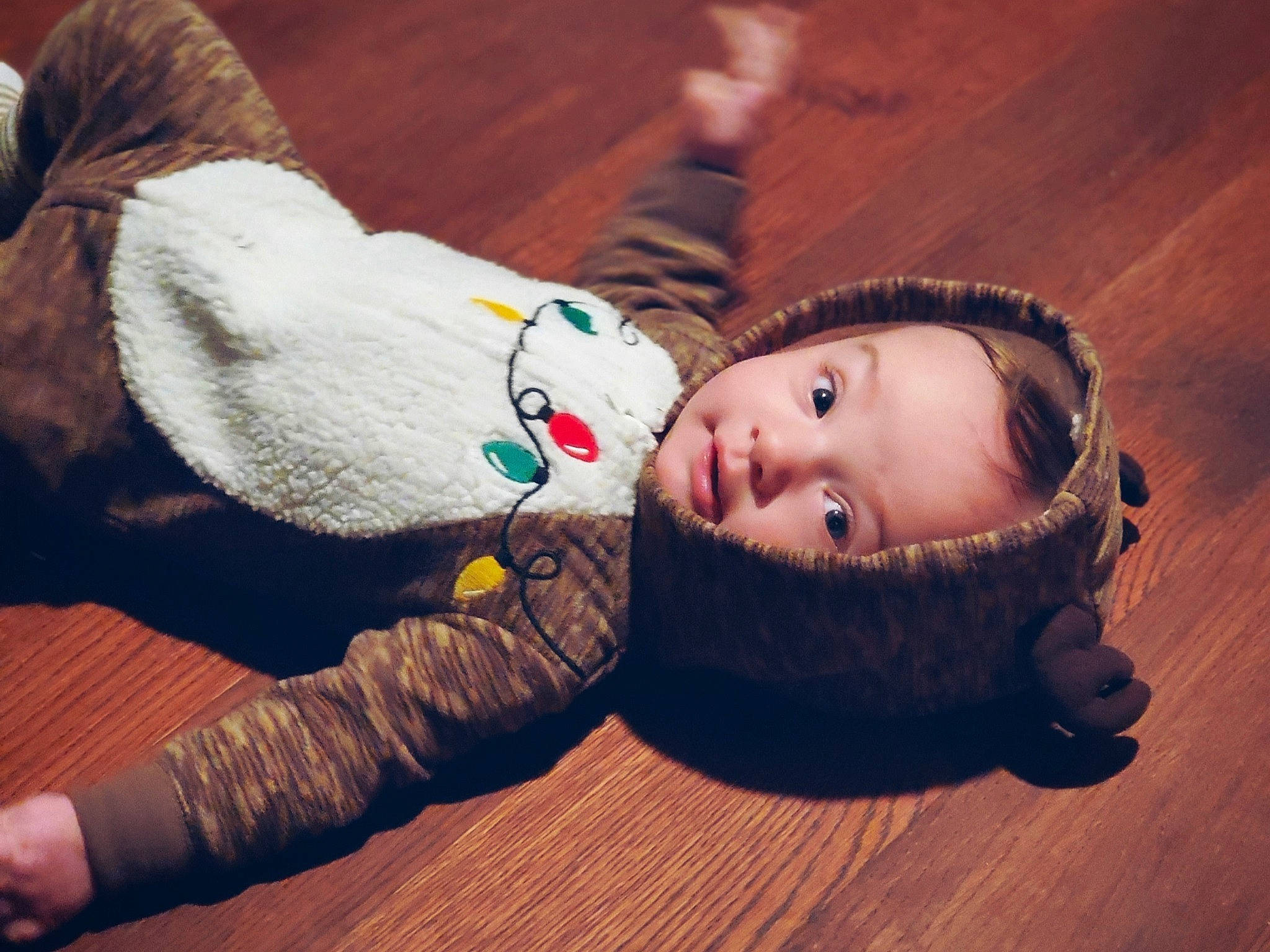 Kingsley is registered to the contest to win money with this photo: baby, baby_products, baby_toddler_clothing, beanie, cheek, child, child_model, fictional_character, fur, human, pack_animal, person, plush, stuffed_toy, toddler, wood_flooring