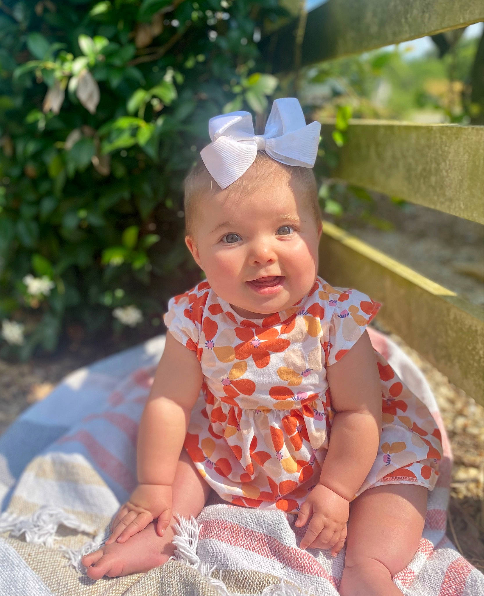 Annastyn joined the competition — help win amazing prizes! baby, baby_toddler_clothing, child, clothing, dress, fashion_accessory, fun, grass, happy, hat, headband, headgear, leaf, pattern, person, pink, plant, sitting, sleeve, smile