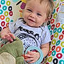 Giovanna joined the competition — help win amazing prizes! baby, child, smiling, toddler, toy, teething_ring, baby_chair, colorful, pattern, clothing, face, hair, hand, comfort, indoor, playful, sun_design, soft_toy, happy, portrait