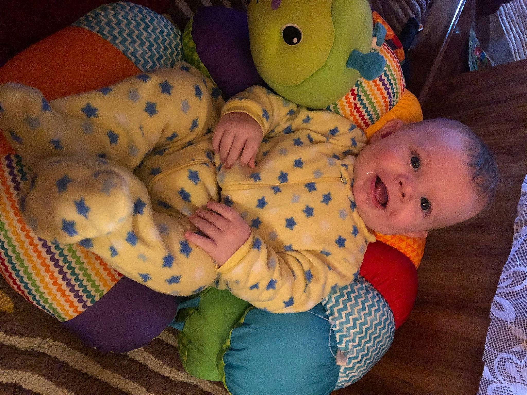 Timber joined the competition — help win amazing prizes! baby, baby_products, baby_toddler_clothing, blue, cheek, child, comfort, facial_expression, foot, happy, mammal, nose, pattern, person, room, skin, smile, toddler, toy, vertebrate
