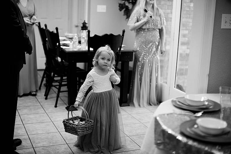 Addie is registered to the contest to win money with this photo: beauty, black, black_and_white, bridal_clothing, chair, dress, flash_photography, furniture, gown, grey, happy, monochrome, monochrome_photography, people, person, photograph, snapshot, standing, style, table